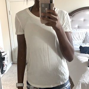 This is a white/cream basic tee.